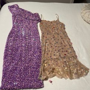 2 dresses for the price of 1. One dress with tags. Both lined.